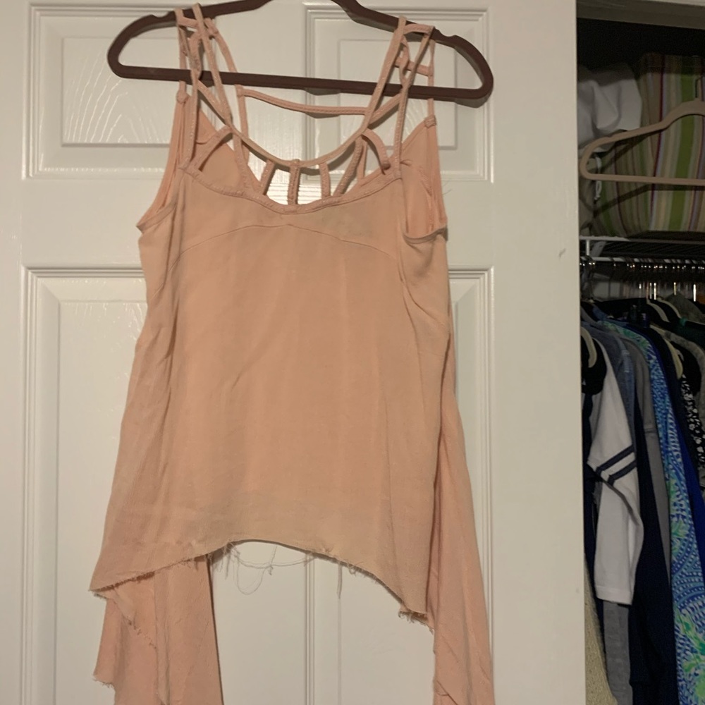 Light pink distressed top